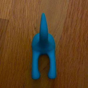 Dinosaur tail wall hanger